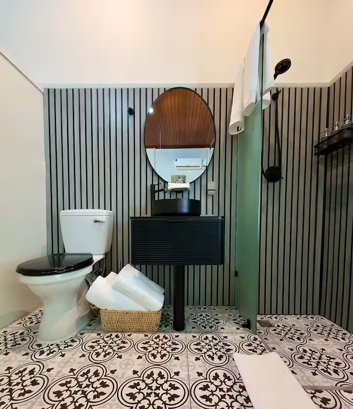 Ensuite bathroom with patterned tiles